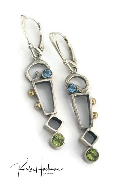 Geometric Statement Earrings in Silver & Gold! Embellished with 18K gold accents and featuring rectangles and cubes and textured elements, 5mm peridot, and 4mm Swiss blue topaz 