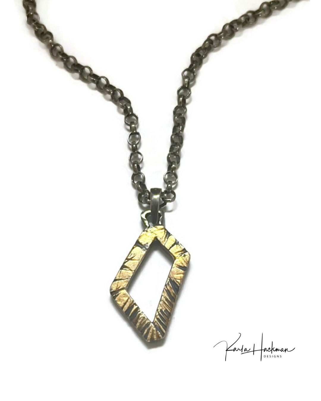 Gold rectangle  pendant on a white background with sterling silver chain