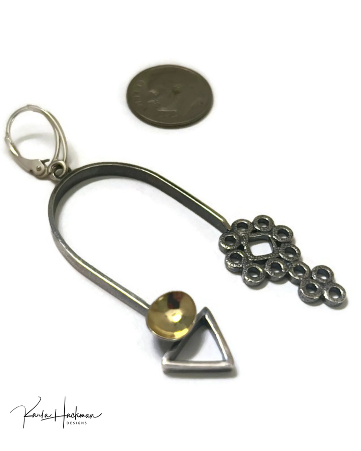 geometric earrings in a mobile design on white background