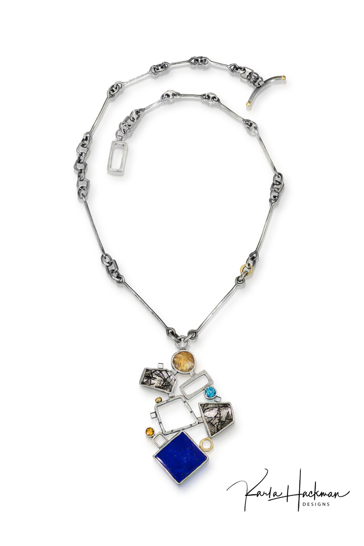 Necklace with colorful pendant on a white background, featuring the Karla Hackman Designs logo.