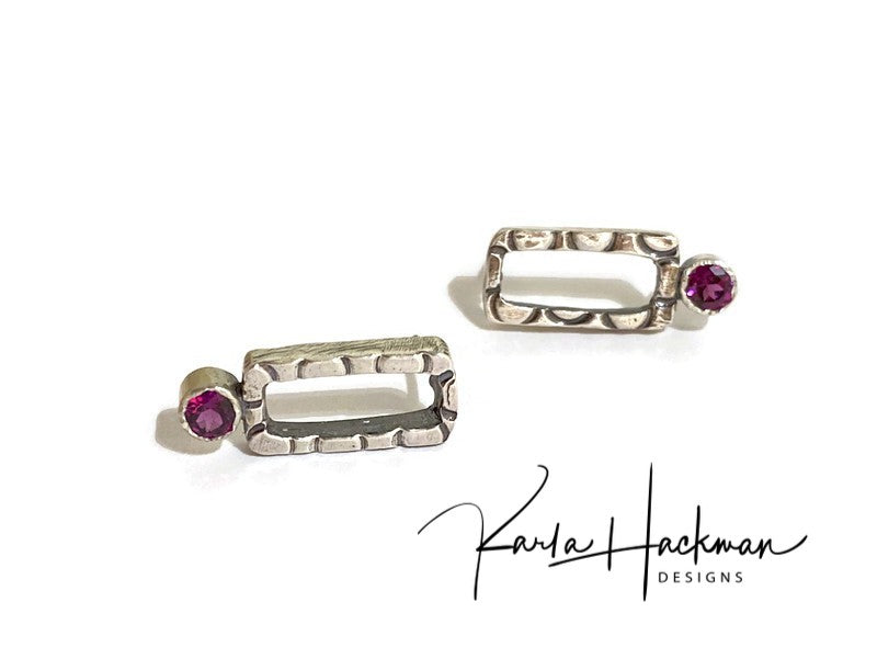 These sterling silver rectangle studs are given a one-of-a-kind texture (each pair will vary slightly), an oxidized finish to highlight the design, and then adorned with a 4mm gemstone, rhodolite garnets or topaz.